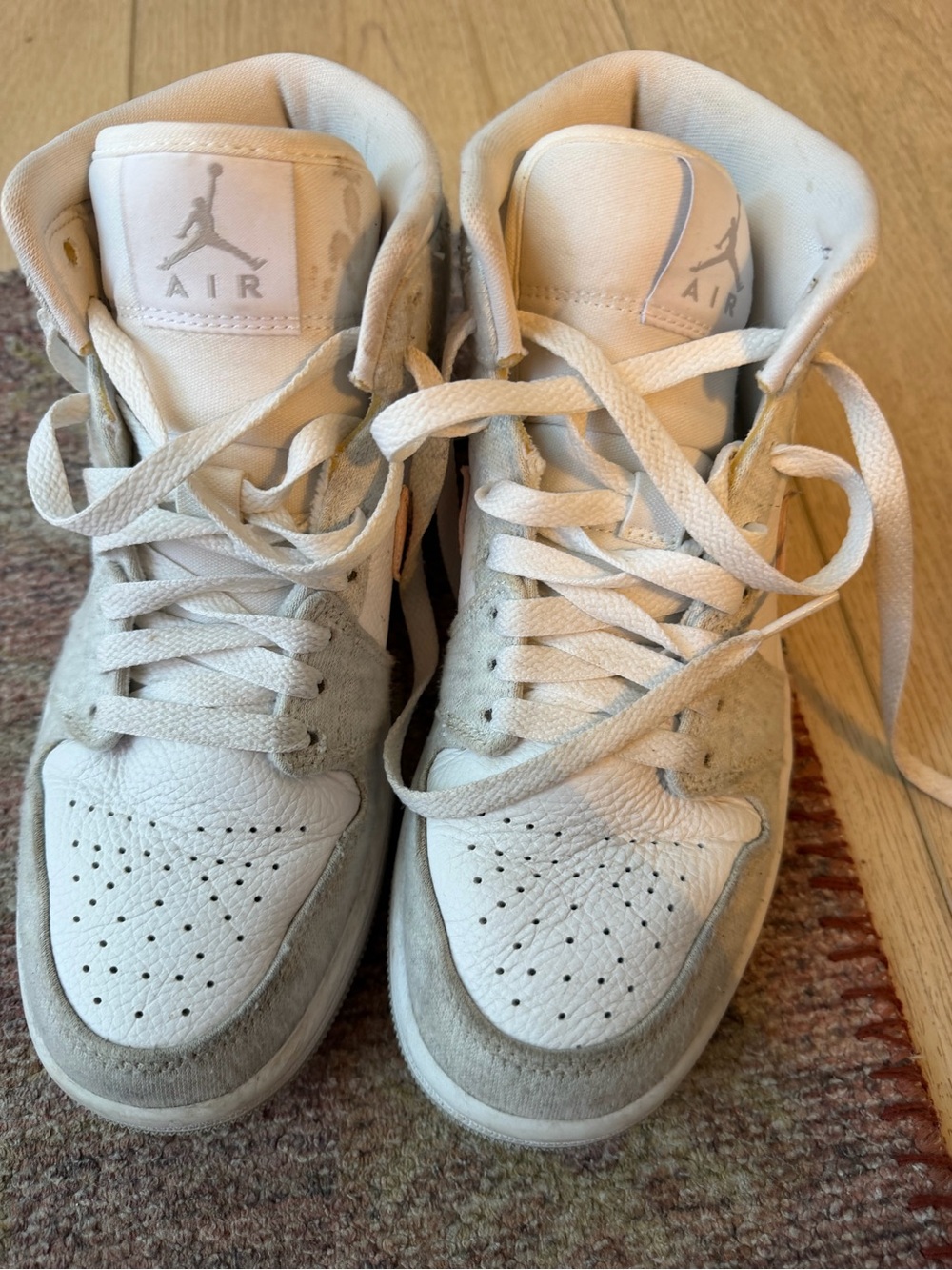 Nike Jordan’s Women's White and Light Gray High-Top Sneakers